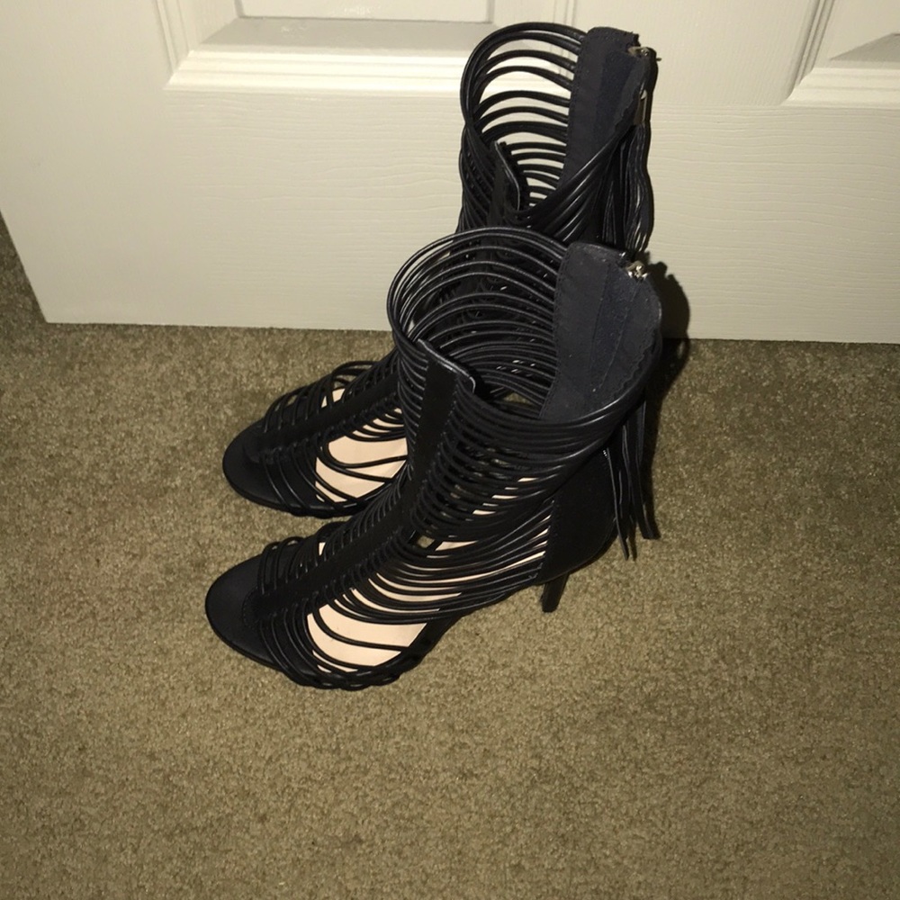 Black heels never worn. Size 6 1/2 JustFab